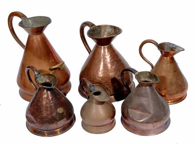 Appraisal: A COLLECTION OF SIX ANTIQUE COPPER JUG MEASURES two five