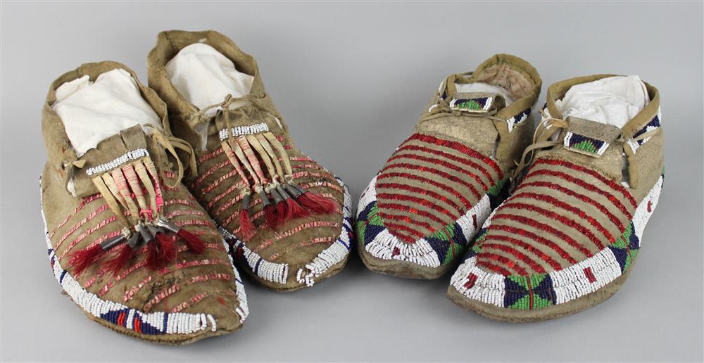 Appraisal: TWO PAIRS OF NATIVE AMERICAN BEADED AND QUILLED HIDE MOCCASINS