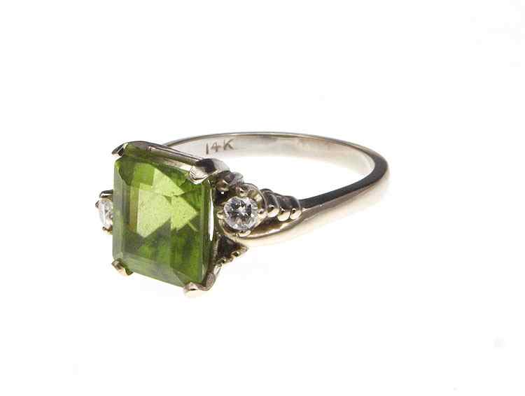 Appraisal: CT TOURMALINE RING WITH DIAMONDS K white gold ring contains