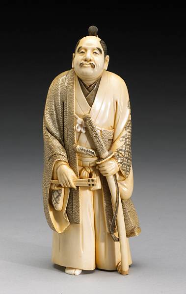 Appraisal: A large ivory figural okimono th Century Signed Seigetsu Well