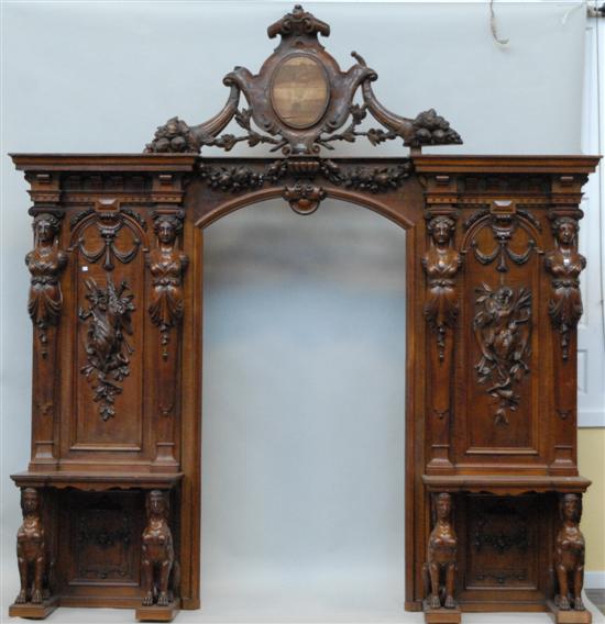 Appraisal: A HEAVILY CARVED HALL BENCH In three parts with figural