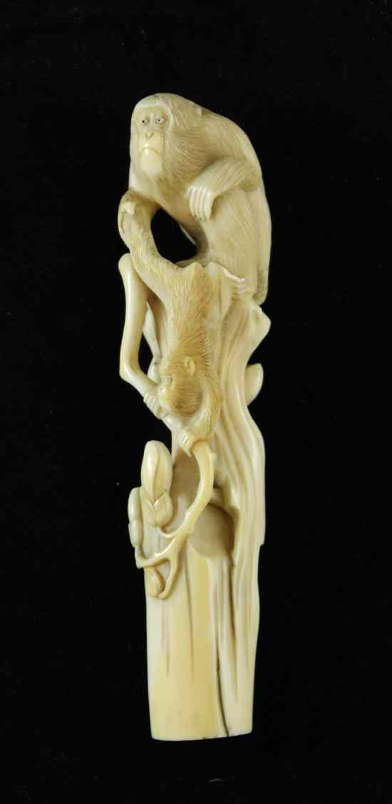 Appraisal: A Japanese ivory parasol or cane handle Meiji period -