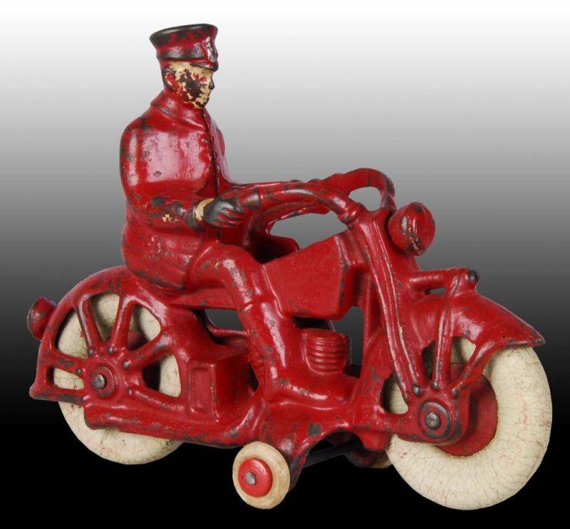 Appraisal: Cast Iron A C Williams Motorcycle Toy Description Policeman rider