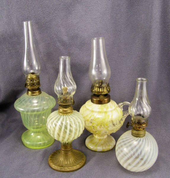 Appraisal: - Miniature Kerosene Lamps Includes Pale yellow colored glass oil