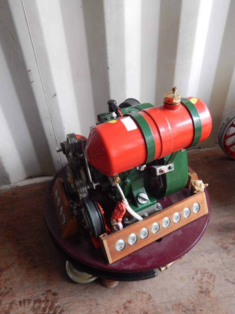 Appraisal: A stationary engine attached to stand set to dynamos and