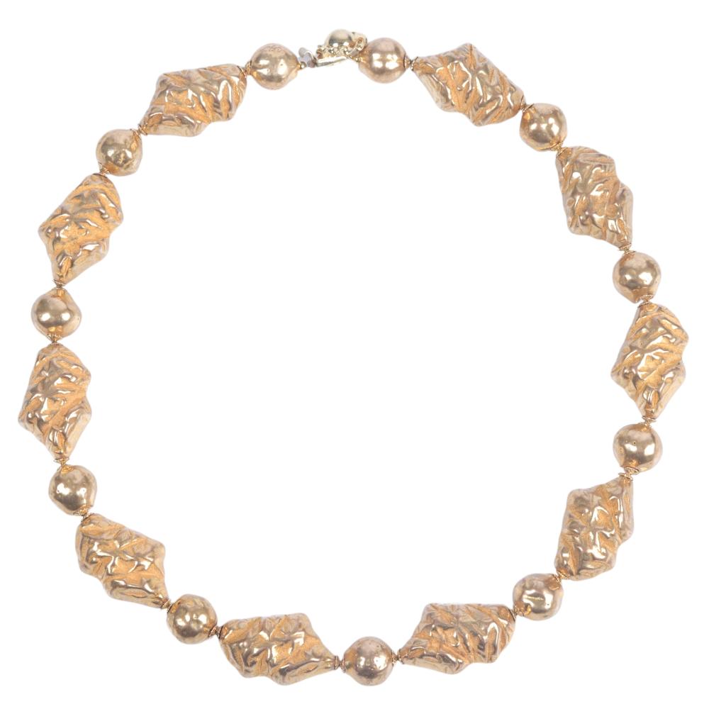 Appraisal: DELILLO CHUNKY GOLDEN NATURAL SHAPED NUGGET NECKLACE LDeLillo chunky golden