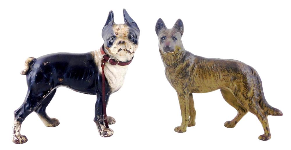 Appraisal: Hubley etc two cast iron dog doorstops Hubley black and