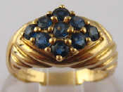 Appraisal: A carat gold sapphire cluster ring size M gms