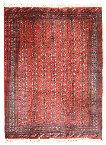 Appraisal: A late Bokhara carpet the copper-red field with seven columns