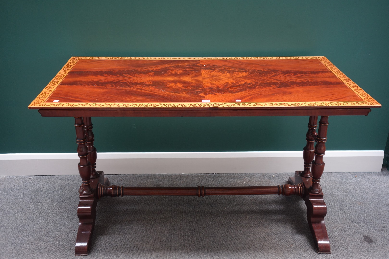 Appraisal: A th century Italian marquetry inlaid rectangular mahogany centre table