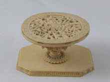 Appraisal: A carved Chinese small stand in the form of a