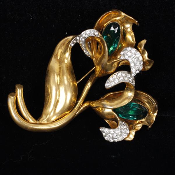 Appraisal: Sandor goldtone Floral Spray pin Brooch with green rhinestones and