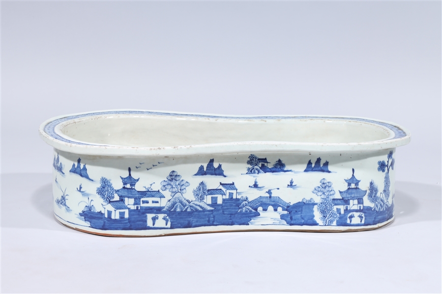 Appraisal: Chinese porcelain blue and white double gourd-shaped basin with river