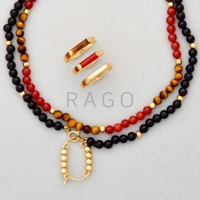 Appraisal: GOLD HARDSTONE NECKLACE AND RINGS Six pieces Two Tiger s