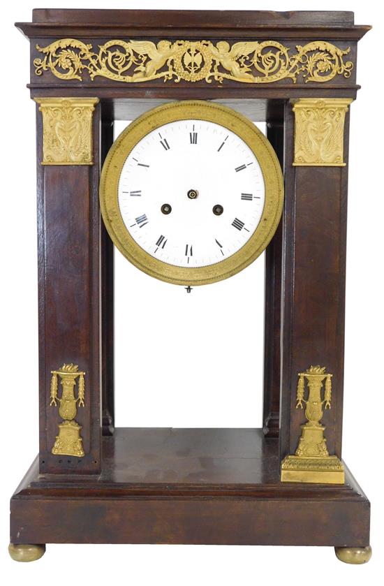 Appraisal: French Four Column Mantle Clock c case decorated with Neo-Classical