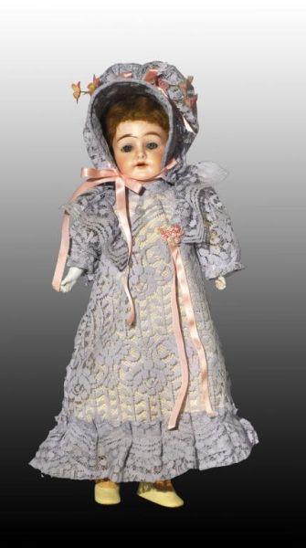 Appraisal: Open Mouth Doll in Blue Lace Outfit Description Bisque hands