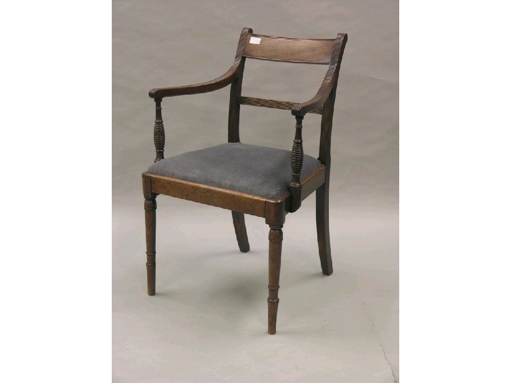 Appraisal: A Sheraton period mahogany elbow chair reeded frame with bar