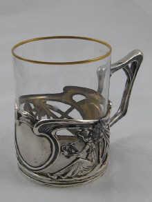 Appraisal: A German silver Art Nouveau tea glass holder with glass