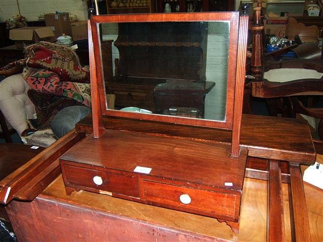 Appraisal: A Victorian mahogany dressing table mirror the rectangular glass over