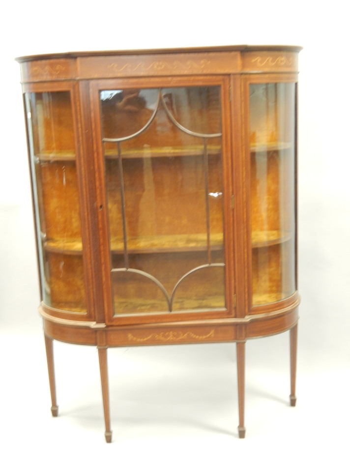 Appraisal: An Edwardian mahogany and marquetry display cabinet the single glazed