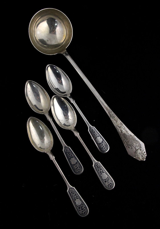 Appraisal: A set of four white metal Damascene table spoons fiddle