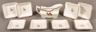 Appraisal: Nine Pieces of Ironstone Tea Leaf China Eight square sauce