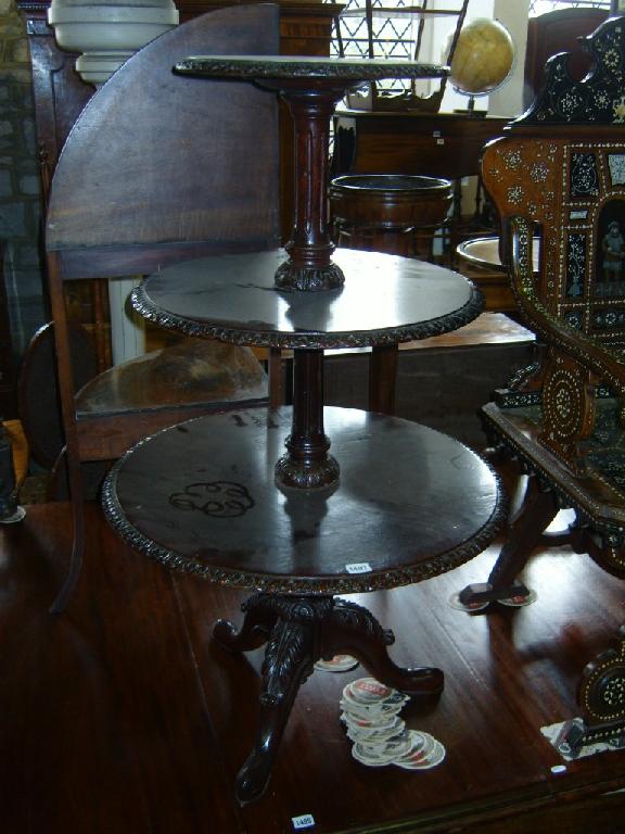 Appraisal: A Victorian oak -tier what-not of circular form with carved