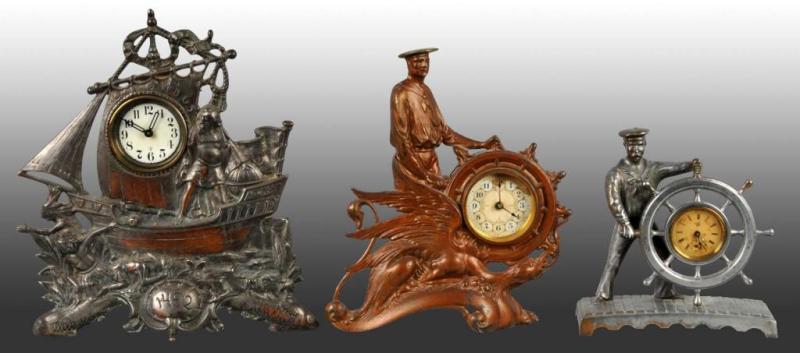 Appraisal: Lot of Metal Clocks Description Includes one Columbus on boat