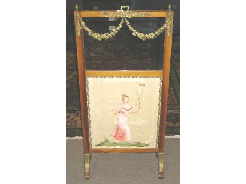 Appraisal: CONTINENTAL FRUITWOOD AND ORMOLU FIREPLACE SCREEN Top rail with small