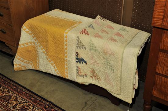 Appraisal: TWO QUILTS American th century cotton Sawtooth quilt in a