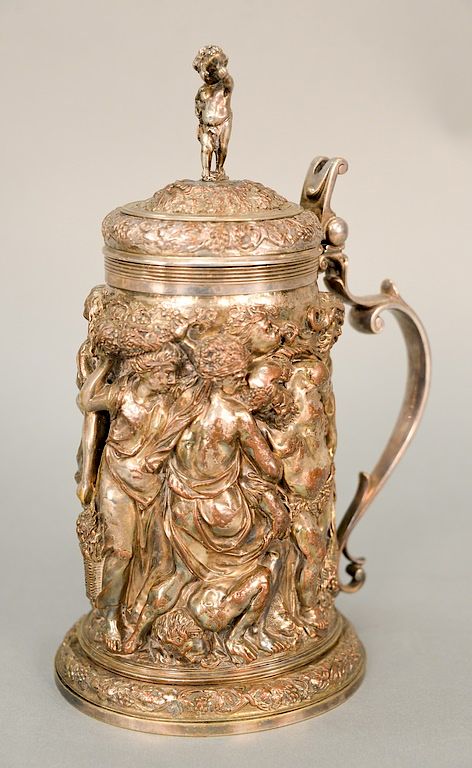 Appraisal: Continental silver on copper tankard with highly embossed body of