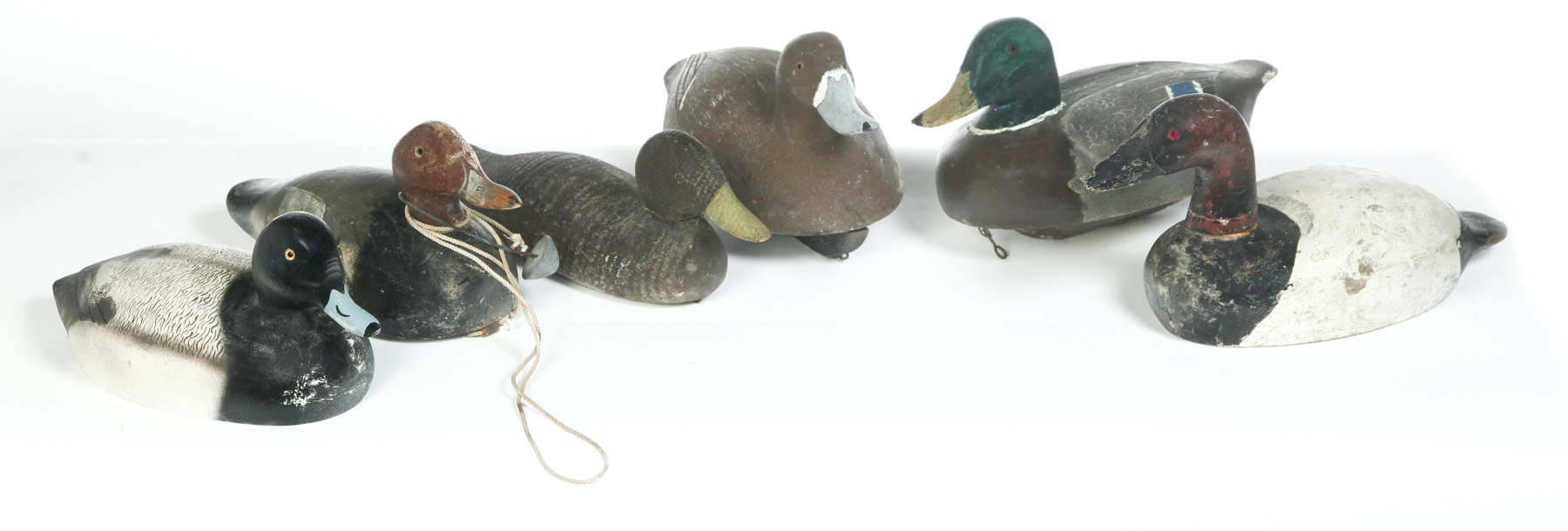 Appraisal: SIX DUCK DECOYS WITH OLD PAINT AND GLASS EYES American