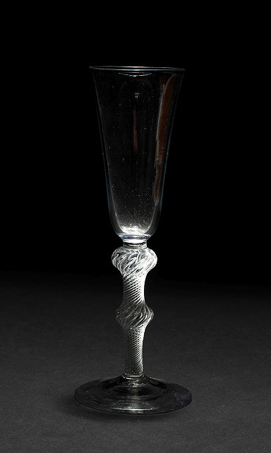 Appraisal: A GEORGE III ALE FLUTE with conical bowl double knopped