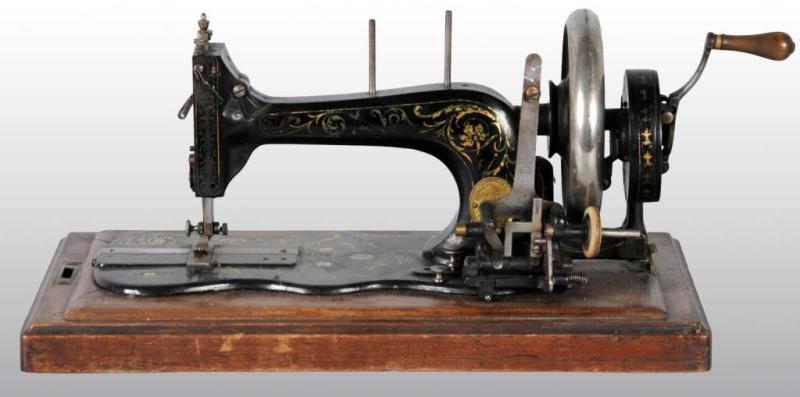 Appraisal: Cast Iron German Frisie Rossmann Sewing Machine Description Circa Working