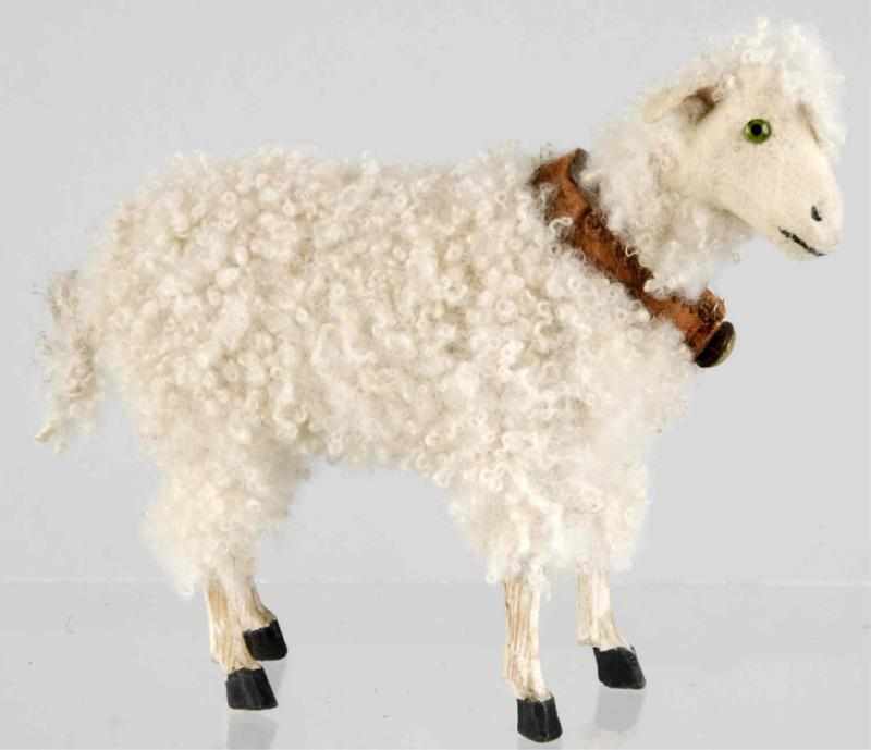 Appraisal: Wooly Sheep Candy Container Description Wooden legs and glass eyes