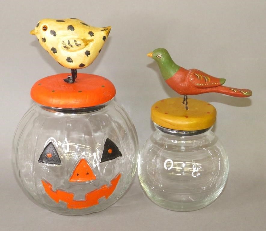 Appraisal: CLEAR CANDY JARS WITH FOLK ART CARVED LIDS BY WAca