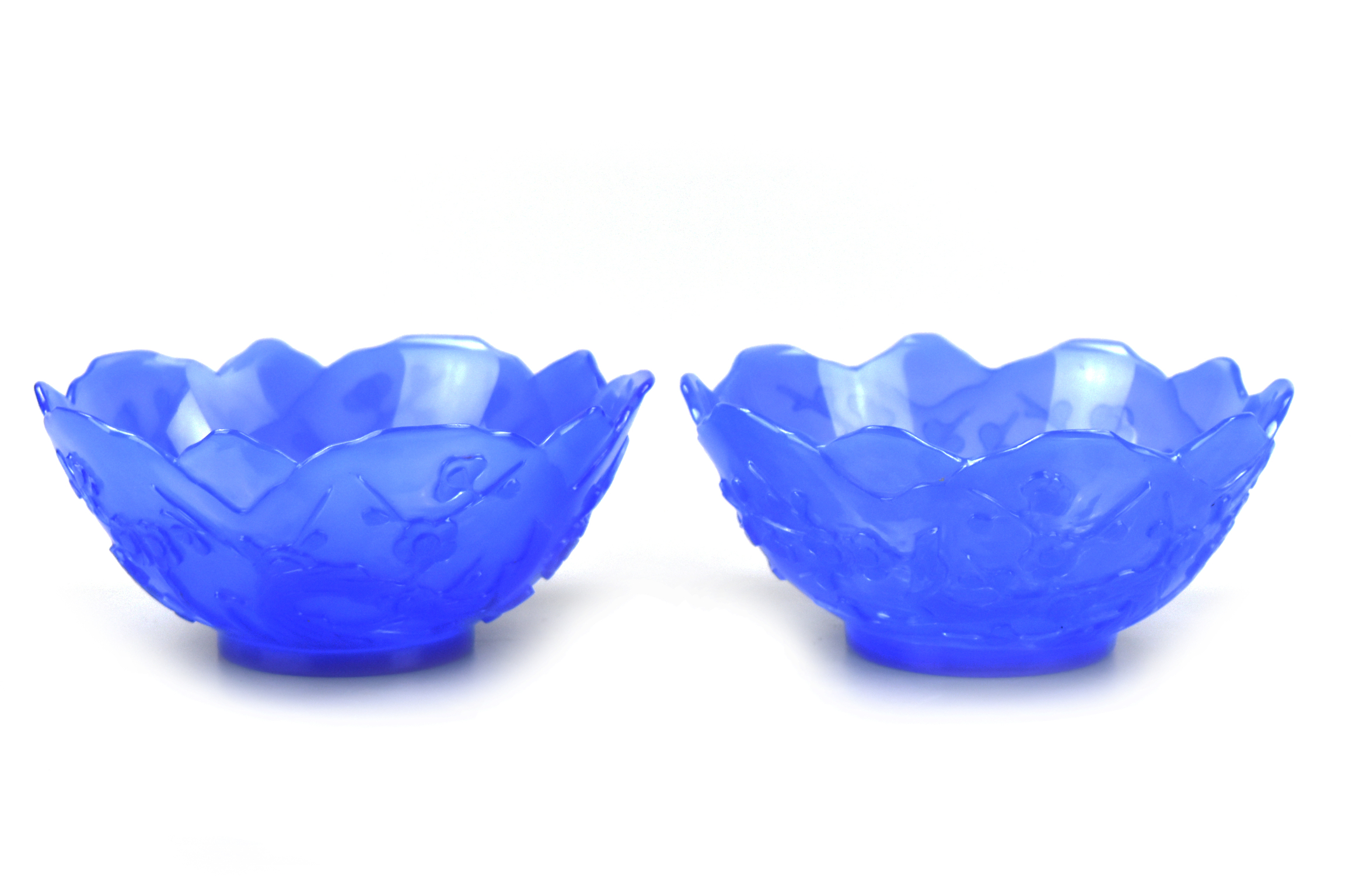 Appraisal: Two beautiful Chinese sky blue peking glass bowls their edges