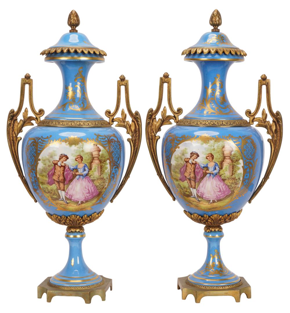 Appraisal: PAIR OF SEVRES-STYLE PORCELAIN URNSSevres-style interlaced L mark each printed