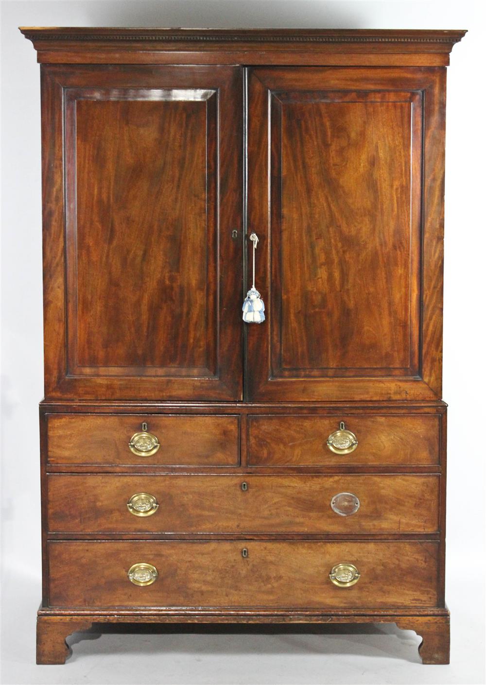 Appraisal: GEORGE III MAHOGANY LINEN PRESS CIRCA in two parts the