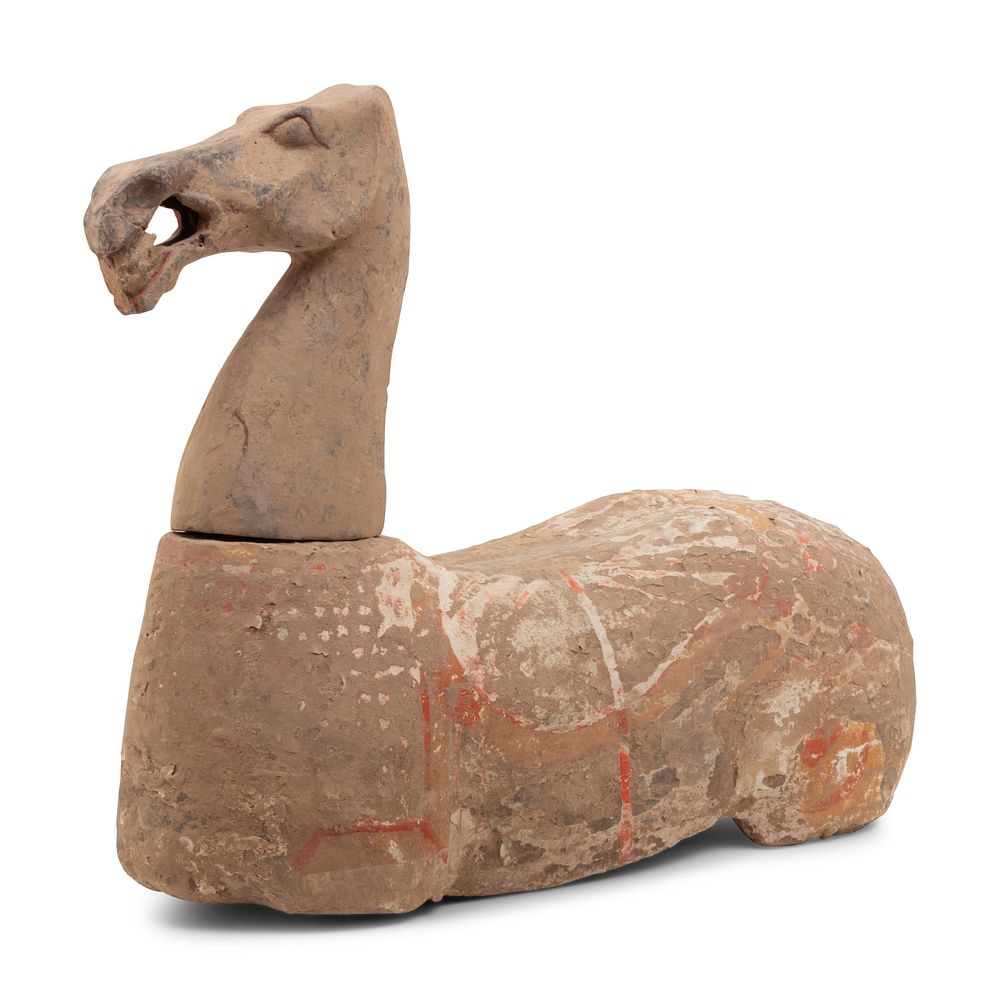 Appraisal: A Chinese Pottery Figure of a Recumbent Horse A Chinese