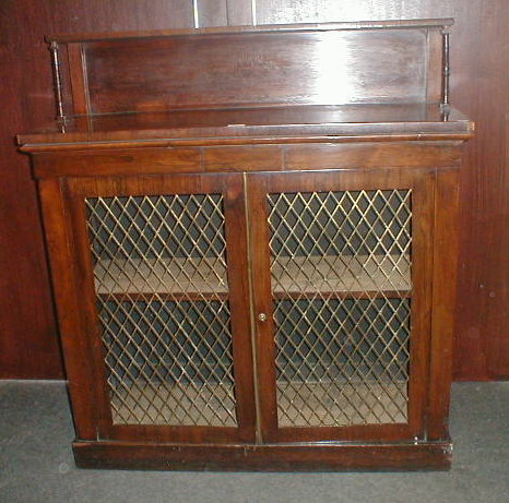 Appraisal: A Regency rosewood chiffonier with brass grille doors wide