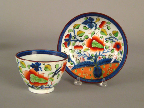 Appraisal: Gaudy Dutch cup and saucer th c in the dove