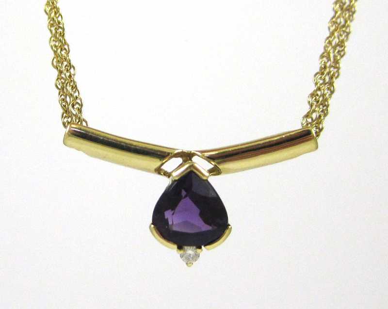 Appraisal: AMETHYST AND EIGHTEEN KARAT GOLD NECKLACE Between two lengths of