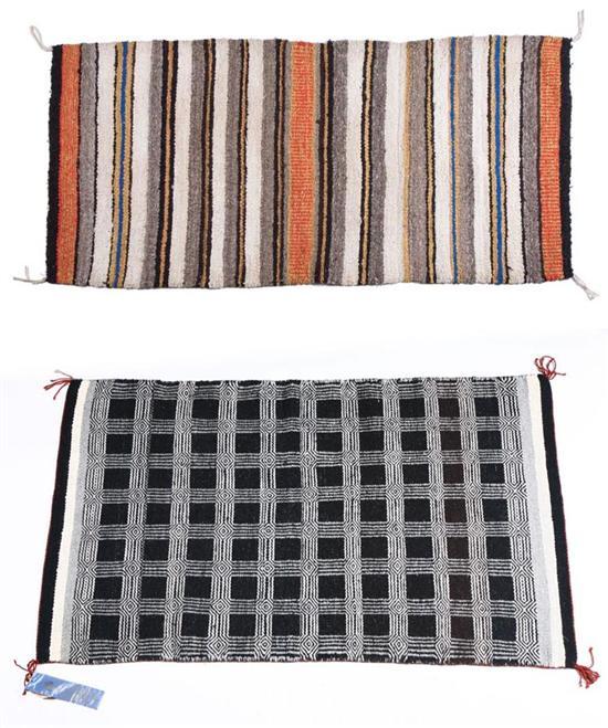 Appraisal: TWO NAVAJO TEXTILES Twentieth century The first is a twill