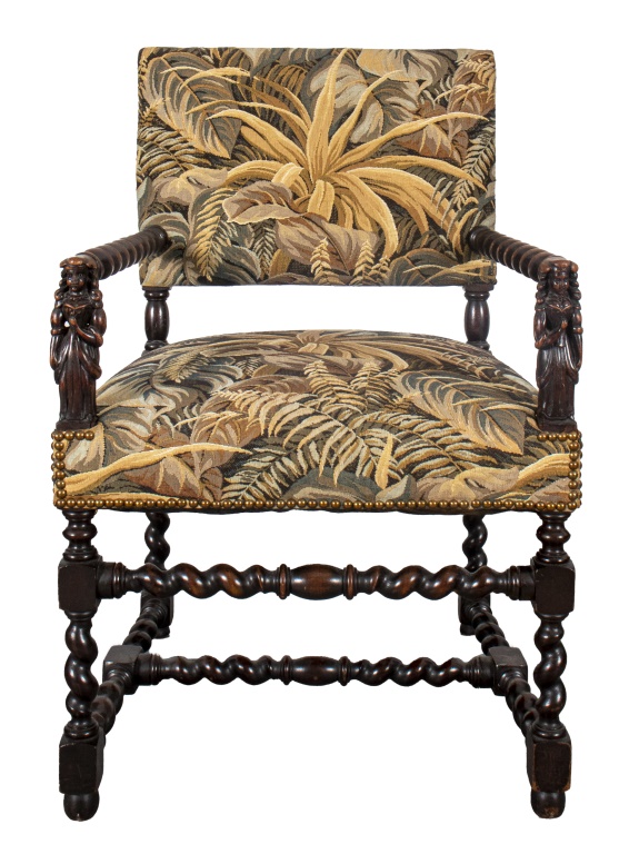 Appraisal: JACOBEAN REVIVAL CARVED WOOD ARMCHAIR Jacobean Revival open frame armchair