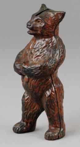 Appraisal: MEAN STANDING BEAR STILL BANK Hubley cast iron ''pat applied