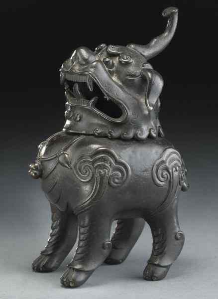 Appraisal: Chinese Qing bronze censerdepicting a Qilin with a removable head