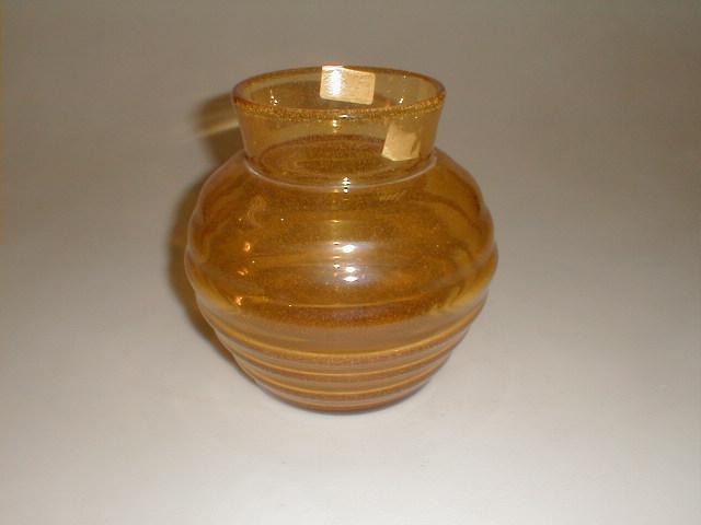 Appraisal: An amber globular ribbed bowl with bubble inclusions high