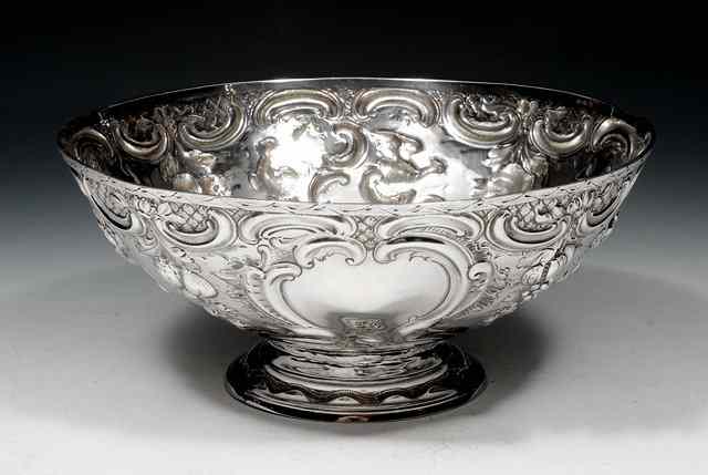 Appraisal: A GEORGE III SILVER BOWL chased with garlands and baskets