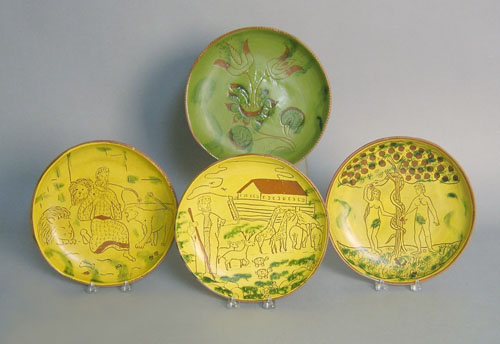 Appraisal: Four Breininger sgraffito redware plates